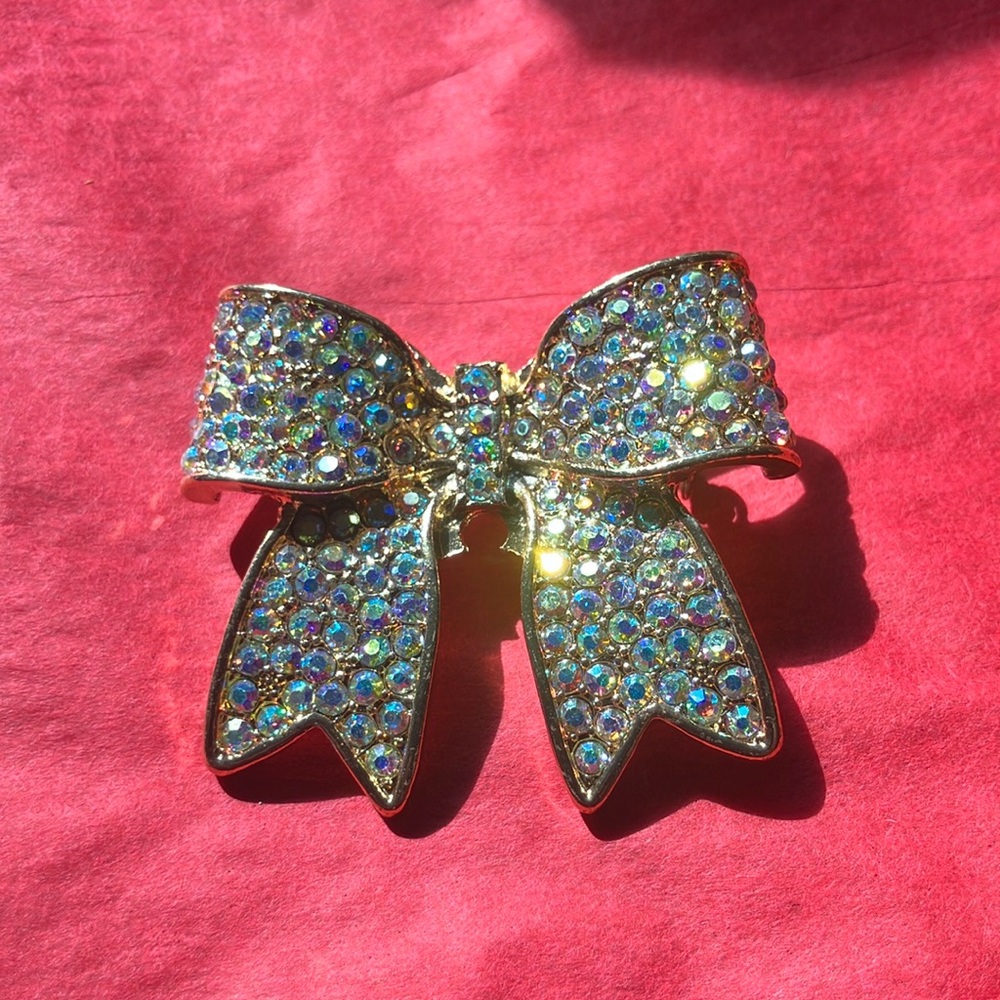 Sparkling Gold Tone Bow Brooch With AB Coated Rhinestones